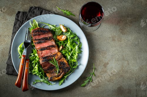 Preview: Steak ribeye, grilled with pepper and garlic.