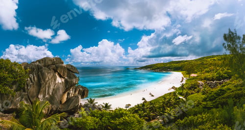 Preview: Panoramic view of beautiful Grand Anse beach on La Digue island in Seychelles. Blue lagoon with