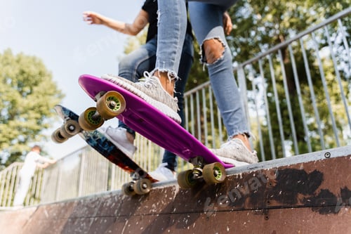 Preview: Children friends ready for penny board ride on skate park. Teen sports gear.