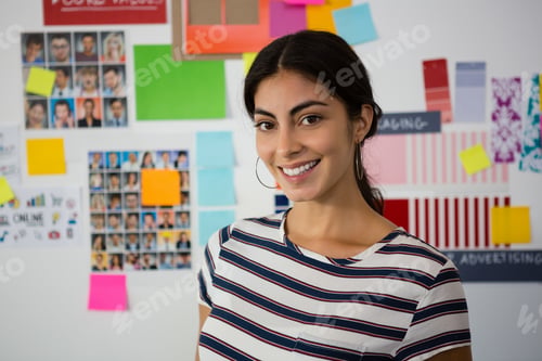Preview: Portrait of beautiful woman against sticky notes in office