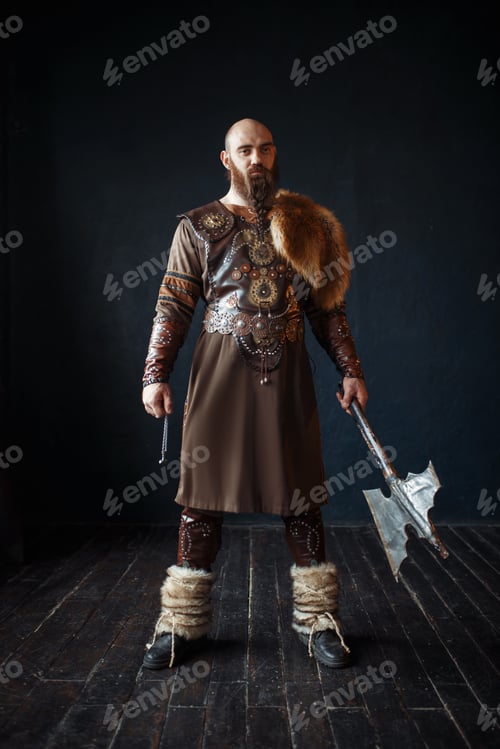 Preview: Viking with axe in traditional nordic clothes