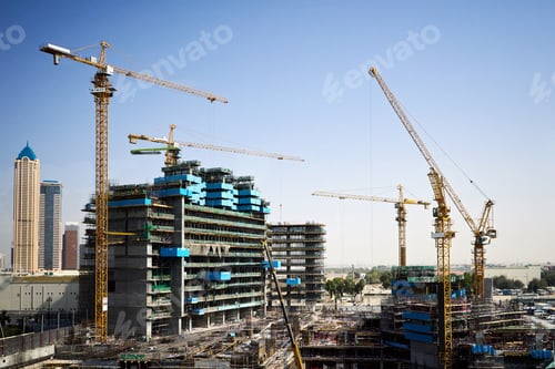 Preview: Construction site with cranes and people working