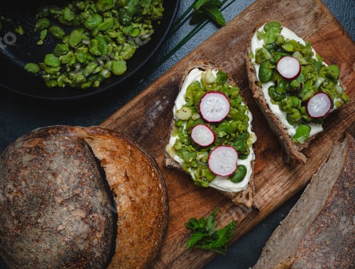 Preview: Toasted Bread Slices Topped with Green Broad Beans