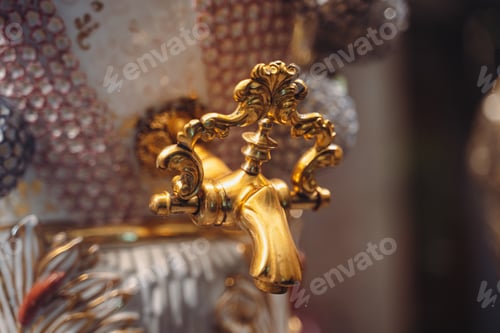 Preview: closeup of gold plated spigot of glass samovar