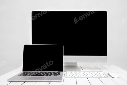 Preview: Close up view at computer and laptop