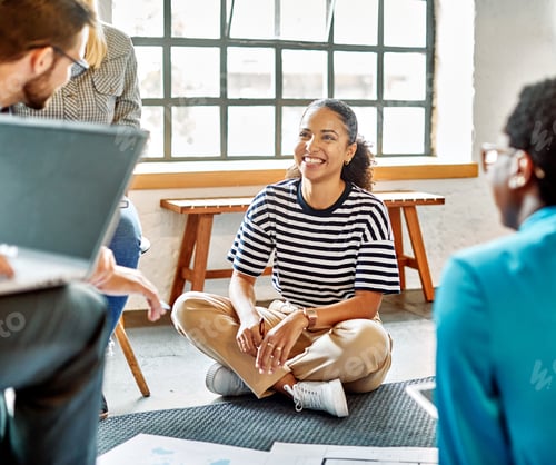 Preview: Young businesspeople having a meeting in the office