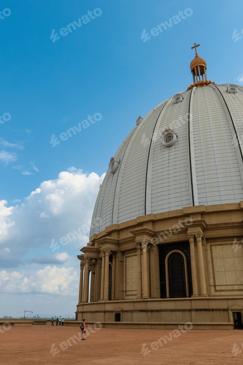 Preview: Basilica of Our Lady of Peace in Yamoussoukro Ivory Coast under a blue sky