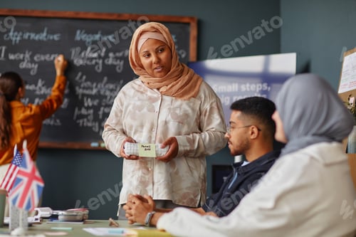 Preview: Muslim Woman Teaching Multiethnic Young Adults in Language School