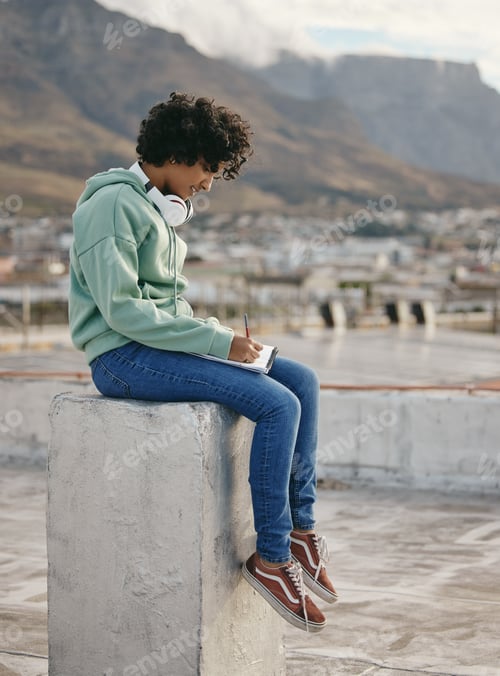 Preview: Relax writing woman on outdoor rooftop for song lyrics inspiration, motivation and peace on Hollywo