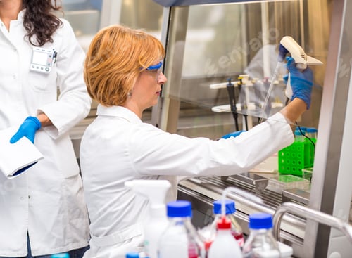 Preview: Photo of real female scientist researching in laboratory.