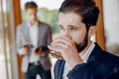 Preview: Two businessmen working at the office