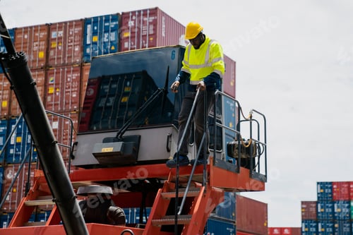 Preview: African American working engineer foreman walk down from the crane