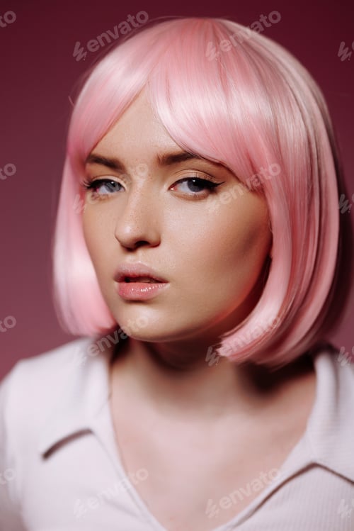 Preview: Portrait of a young woman with a pink bob