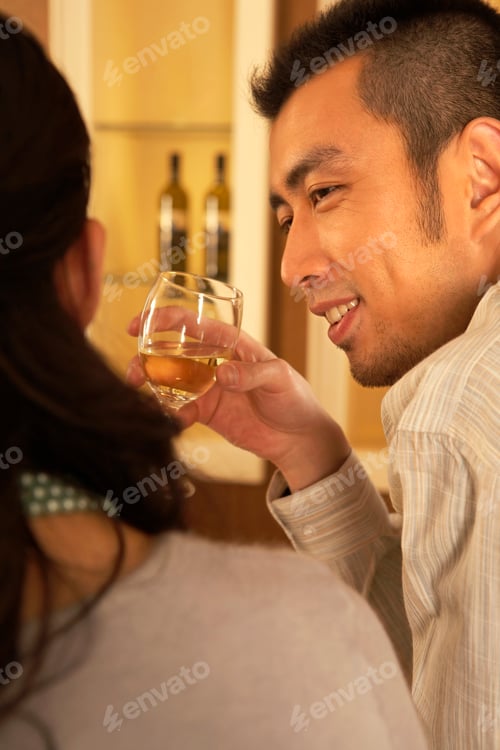 Preview: Couple Drinking Wine In Bar