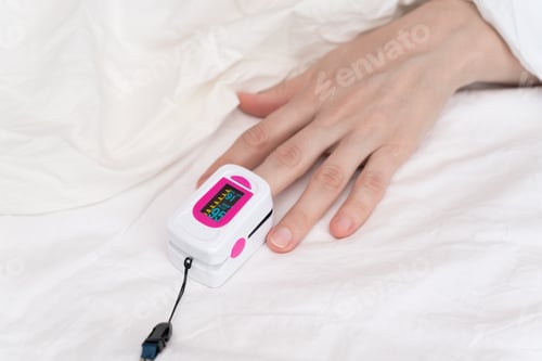 Preview: The process of measuring oxygen saturation with a pulse oximeter on a finger closeup