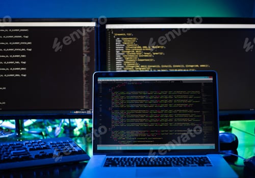 Preview: Three computer screens with computer programming code