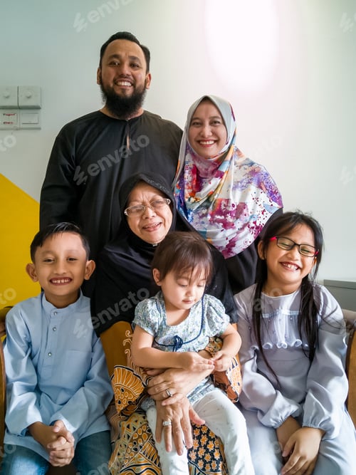 Preview: Malay muslim happy family portrait during hari raya celebration