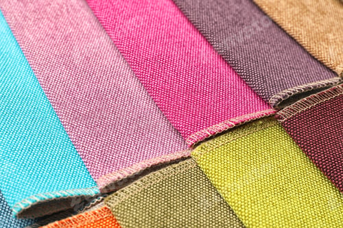 Vorschau: Stoffmuster in verschiedenen Farben für die Innenausstattung als Hintergrund