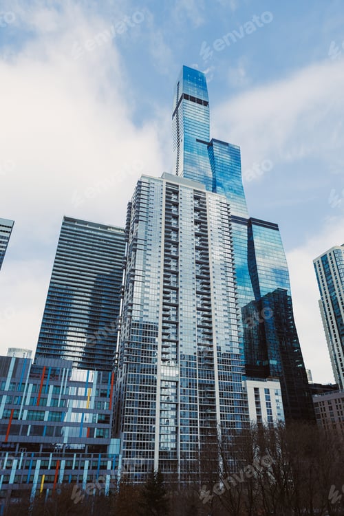 Preview: Urban skyline view with tall buildings and blue sky in the city during the day