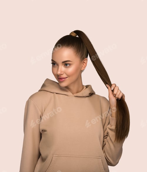 Preview: Woman portrait casual natural studio female long hair. Color background. Yellow