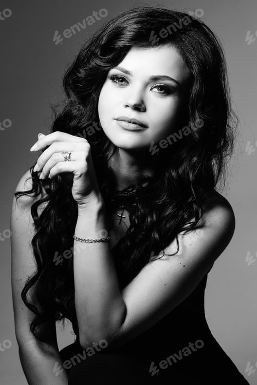 Preview: Black and white portrait of young model with long hair.