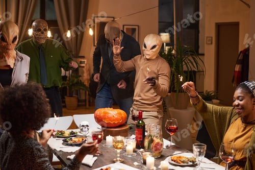 Preview: People having fun during Halloween party