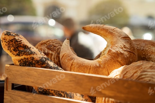 Preview: Various fresh french pastries and bread in a box