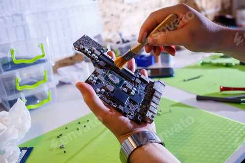 Preview: Professional computer and tablet repair shop or service. Close up of a computer board. Electronics