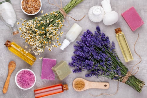 Preview: Grooming products and fresh lavender bouquet on white wooden table background.