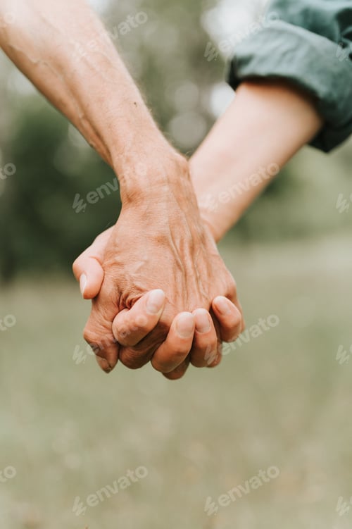 Preview: happy senior couple holding hands. hands of man and woman hold each other. romance love and support