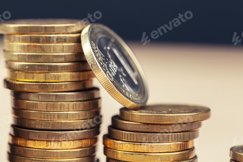 Preview: piles of coins on working table