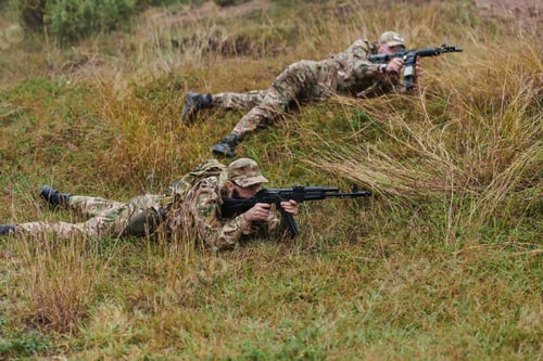 Preview: Elite soldiers stealthily maneuver through the dense forest, camouflaged in specialized gear, as