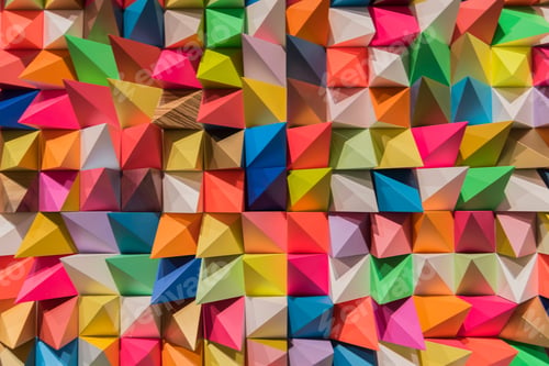 Preview: Colorful geometric angular shapes grouped together, textured background