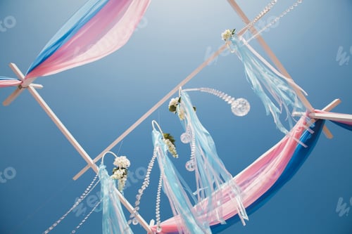 Preview: Wedding arch pink color on the background of the sea.