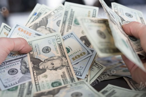 Preview: Big pile of cash in hands