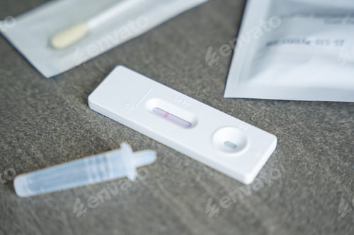 Preview: Rapid Antigen Test kit with with negative result during swab COVID-19 testing. Coronavirus Self