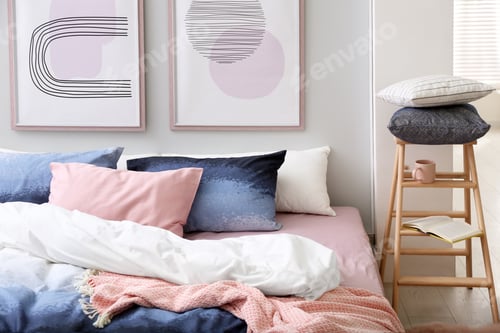 Preview: Large bed with stylish linens in room