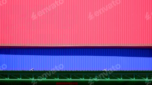 Preview: Colorful red and blue aluminium corrugated steel wall with awning of industrial warehouse building