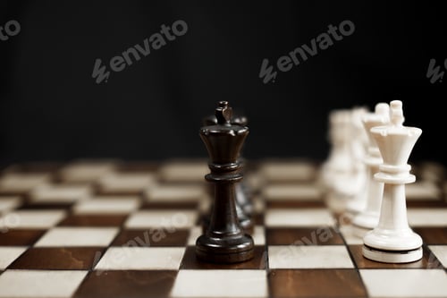 Preview: Chessboard and chess game. Competition between black and white, strategic intelligence board game.