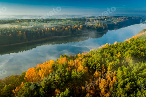 Preview: Crystal clear lake with chemtrail reflection, aerial view