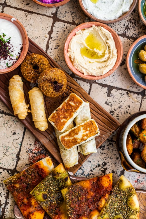 Preview: Fried cheese and falafel with sause in Turkish Village Breakfast. Top view