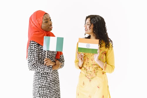 Preview: African and Asian women together on white background