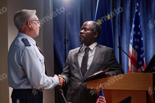 Preview: Politicians shaking hands at conference