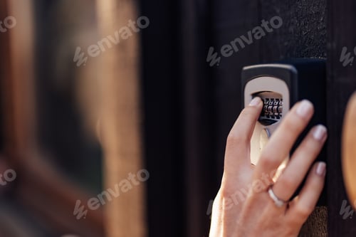 Preview: Person Unlocking Security Keypad With Hand Pushing Buttons Outdoors