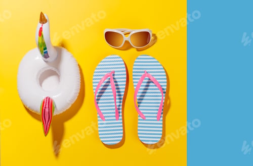 Preview: A vibrant summer vacation scene with flip flops, shades, and a floating flamingo