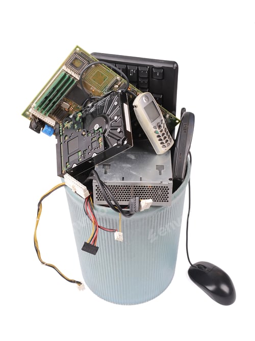 Preview: Different Computer Parts And Phone In Trash Can