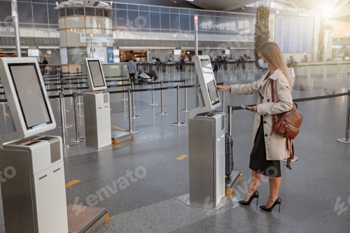 Preview: Pretty lady touching interactive screen to check in online in terminal