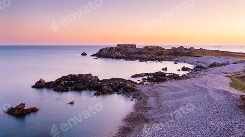 Preview: Calm sunrise overlooking Fort Le Marchant and shooting range in Guernsey