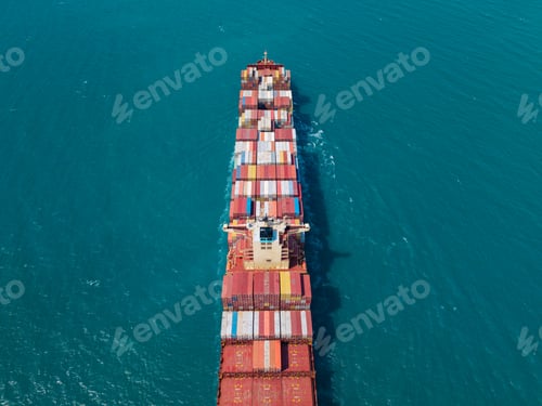 Preview: Large cargo ship transporting colorful containers across ocean