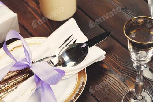 Preview: Holiday table setting on wooden table in lilac colors